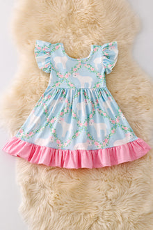  Sweet Lamb printed on blue dress with pink ruffle trim. DRG50360 NAY