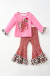 Santa printed on pink long sleeve top and animal printed bottoms w/green ruffle plaid. OFG62999 MON