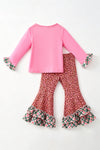 Santa printed on pink long sleeve top and animal printed bottoms w/green ruffle plaid. OFG62999 MON