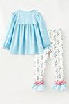 Lt. Blue gingham tunic with pumpkin applique and floral leggings. OFG62654 AMY
