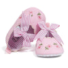Embroidered girls baby shoes with front bow.
