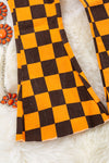 Black & Orange checker printed bootcut denim pants. PNG65133009 EMILY