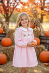 Checkered printed girls dress with pumpkin/bow embroidery. DRG53049 SOL