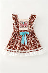 Brown cow printed dress with lace hem and front bow. DRG64467 AMY