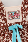 Brown cow printed dress with lace hem and front bow. DRG64467 AMY