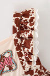 Brown cow printed dress with lace hem and front bow. DRG64467 AMY