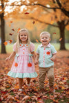 Pink & mint gingham dress with ruffle hem and side bows. DRG64502 MON