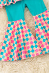 Howdy" Halloween printed on pink checker tunic and teal bell bottoms. OFG61492 jea