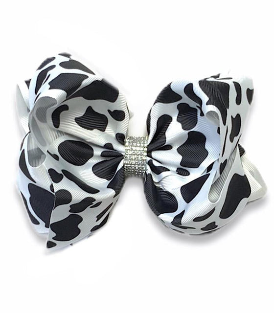 BLACK & WHITE COW SPOT PRINTED HAIR BOW. 7.5" WIDE 4PCS/$10.00 BW-DSG-99