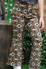 Brown aztec printed bootcut denim pants. PNG25153091 amy