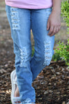 LT. blue distressed skinny jeans. PNG65153028 LOI