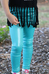 Teal faux leather leggings. png65153009-loi