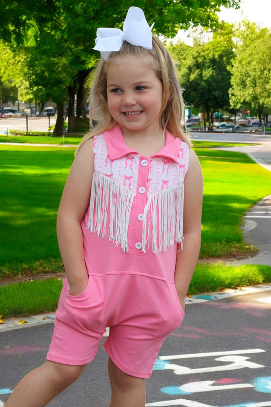 Pink Romper with side pockets and fringe.