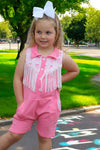 Pink Romper with side pockets and fringe.