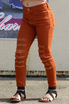 Rust ripped skinny jeans. PNG25133062-sol