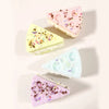 3" Squeeze sticky cake stress toy.