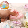 3" Squeeze sticky cake stress toy.