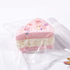 3" Squeeze sticky cake stress toy.