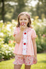 Lt. Coral w/embroidered apples & bows tunic & floral shorts. OFG60547 SOL