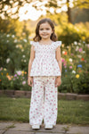 Smocked Ditsy floral printed on white two piece set. OFG62055 JEAN
