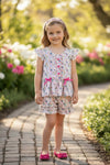 Floral printed w/fuchsia front button and ruffle shorts. OFG62612 AMY