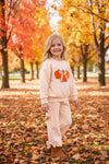 Cream top and bottoms, top has pumpkin applique. OFG62650 AMY