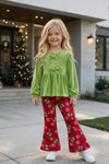Green faux velvety tunic and red pants. OFG63380 MON