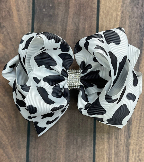 BLACK & WHITE COW SPOT PRINTED HAIR BOW. 7.5" WIDE 4PCS/$10.00 BW-DSG-99