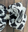 BLACK & WHITE COW SPOT PRINTED HAIR BOW. 7.5" WIDE 4PCS/$10.00 BW-DSG-99
