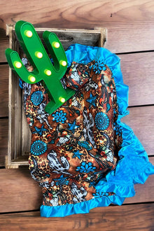  CONCHO, CACTUS & COW SKULL PRINTED BABY BLANKET W/ TURQUOISE TRIM. (35"BY 35") BKG25153010