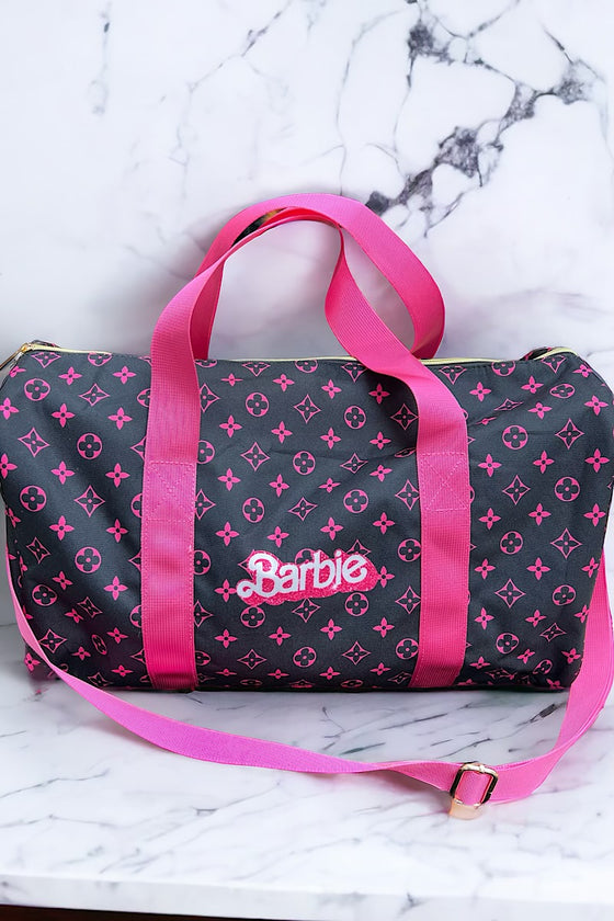 Black star printed & Barbie printed duffle bag with strap. TT2027LR