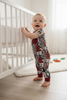 Yee haw" multi-printed boys western romper with snaps. SR102326-Jean