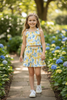 Yellow Coquette bow printed top & skort with ruffle hem. GSD110601-JEAN