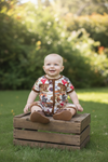 Howdy" Western printed baby romper with snaps.SR112711-SOL