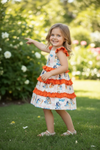 Dog printed character dress with ruffle trim. DRG60225 AMY