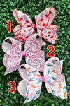 5" Multi printed hair bows with moon stitch trim. 4pcs/$10.50 2026-B