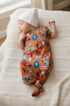Cute bull skull burnt orange printed baby gown. PJB25153009