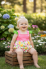 Lemon printed baby bodysuit with ruffle butt. RPG60290 SOL