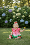 Watermelon tie dye tunic with ruffle sleeves and red shorts. OFG60281 AMY