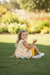Sweet orange on pink tunic and yellow shorts. OFG60282 JEAN