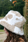 Faux fur bucket hat w/soft cow print. ACG65143003