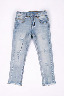  Super stretchy light blue skinny jeans w/distressed hem. PNG25153020-WENDY