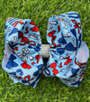 Lt. Blue with multi- printed bow-Patriotic bows. 4pcs/$10.00 BW-DSG-5122