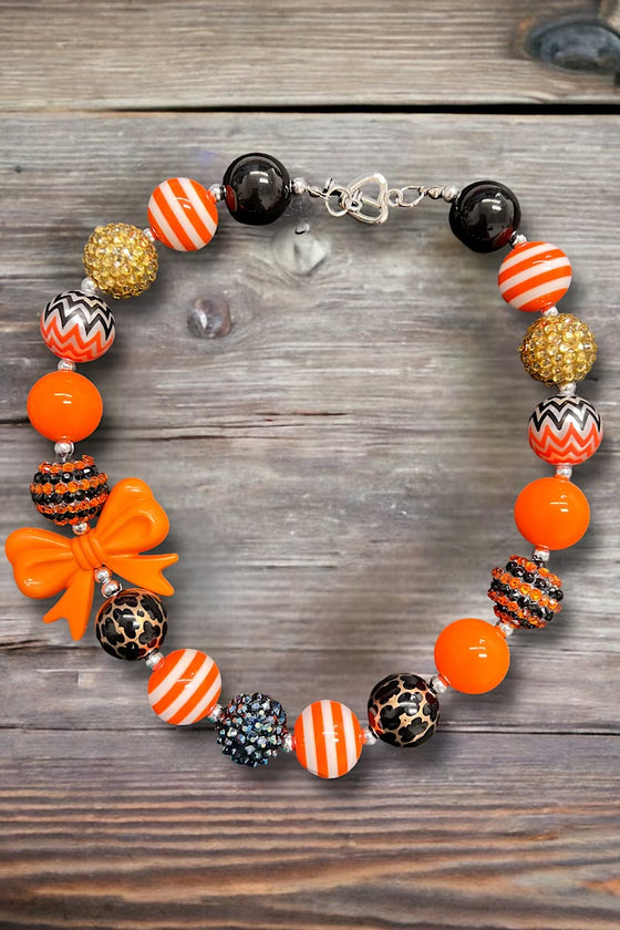 Orange & black Multi-printed bubble gum necklace. 3PCS/$12.00 ACG40113001