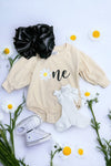 One daisy printed baby onesie with snaps. RPG65153022-sol