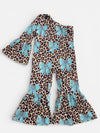 Cheetah printed cold shoulder jumpsuit w/ blue coquette bow. LR112004-JEAN