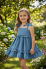 Lt. blue denim dress with ruffle detail. DRG60415 SOL