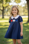 Bow applique on navy blue dress. DRG60697 Jean