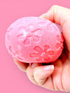 Fuzz ball available in 3 colors.