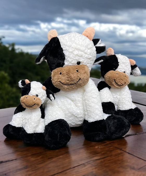 Plushy cow is available in 3 sizes.